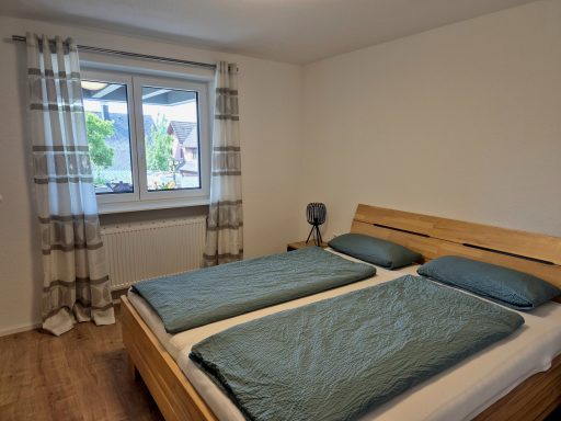 Schlafzimmer 1 Ferienwohnung Schlafzimmer mit Doppelbett
