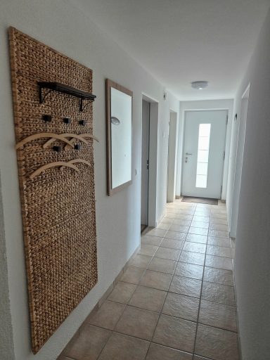 Flur Ferienwohnung Flur mit Garderobe und Spiegel